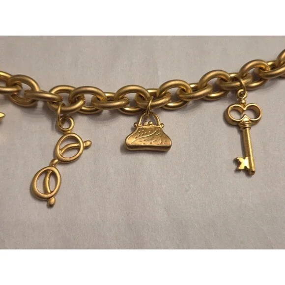 Victoria’s Secret Gold Tone Charm Bracelet VS Logo Missing Charm Toggle Closure - Picture 2 of 5